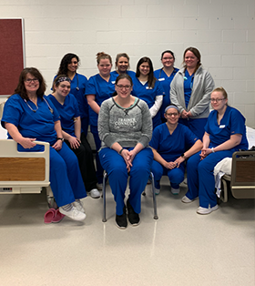 Medical assisting course students posing together during the medical assisting trainer connect